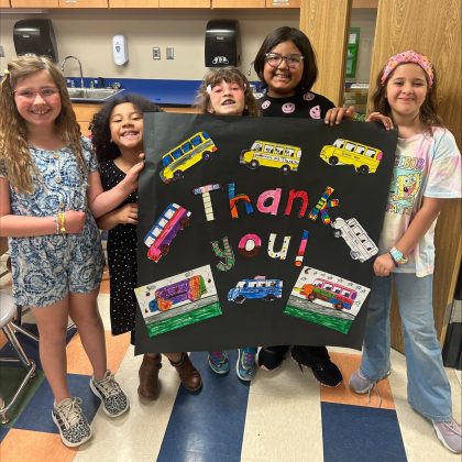 Broken Arrow Public Schools in Oklahoma shared these photos of the Rhoades Kindness Club making banners for their bus drivers