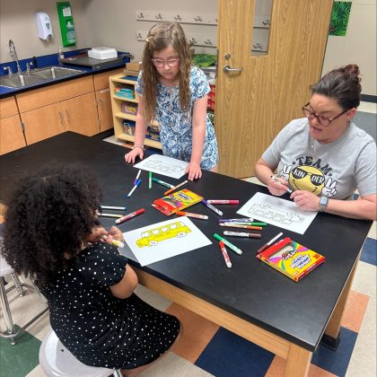 Broken Arrow Public Schools in Oklahoma shared these photos of the Rhoades Kindness Club making banners for their bus drivers