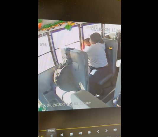 Screenshot from video shared by attorneys of alleged victims of abuse on a Littleton Public Schools Bus in Colorado. The video appears to show bus aide Kiarra Monte Laron Jones strike the student repeatedly.