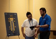 At left, Steven Yang, the shop manager for school bus contractor HAP Transportation in St. Paul Minnesota, demos Zonar EVIR during a Bus Technology Summit lab at STN EXPO Indianapolis on Friday, May 31, 2024.