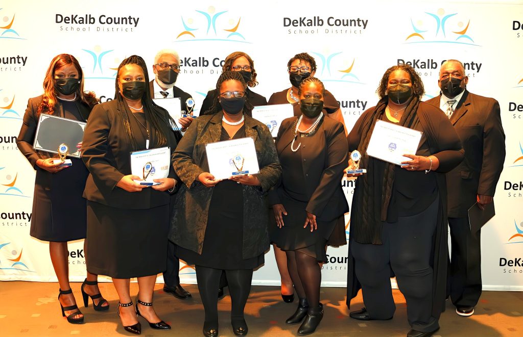 Bernando Brown (far right), director of student transportation at DeKalb County Schools in Georgia, poses with the graduates of the Transportation Leadership Academy on Jan. 21, 2022 (Photo courtesy of Bernando Brown)