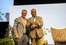 School Transportation News President and Publisher Tony Corpin poses with Pallav Prakash, the director of electrification program management for Zum Services. Prakash was awarded STNs 2024 Innovator of the Year. (Photo courtesy of Vincent Rios Creative.)